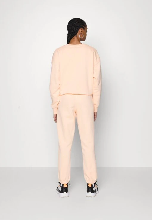 Jordan Pant - Tracksuit Bottoms - Sunset Haze -Jiaxin Sport Shop 7d1f95377cdf4eb6b52973d03bcb1b96 scaled